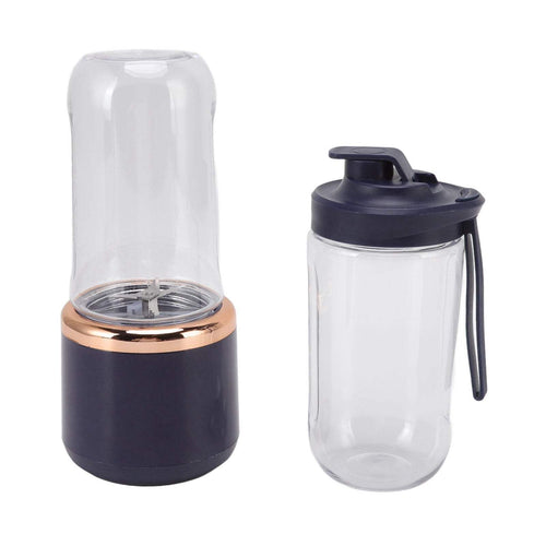 Cordless portable blender bottle with lid, travel-friendly and USB rechargeable.