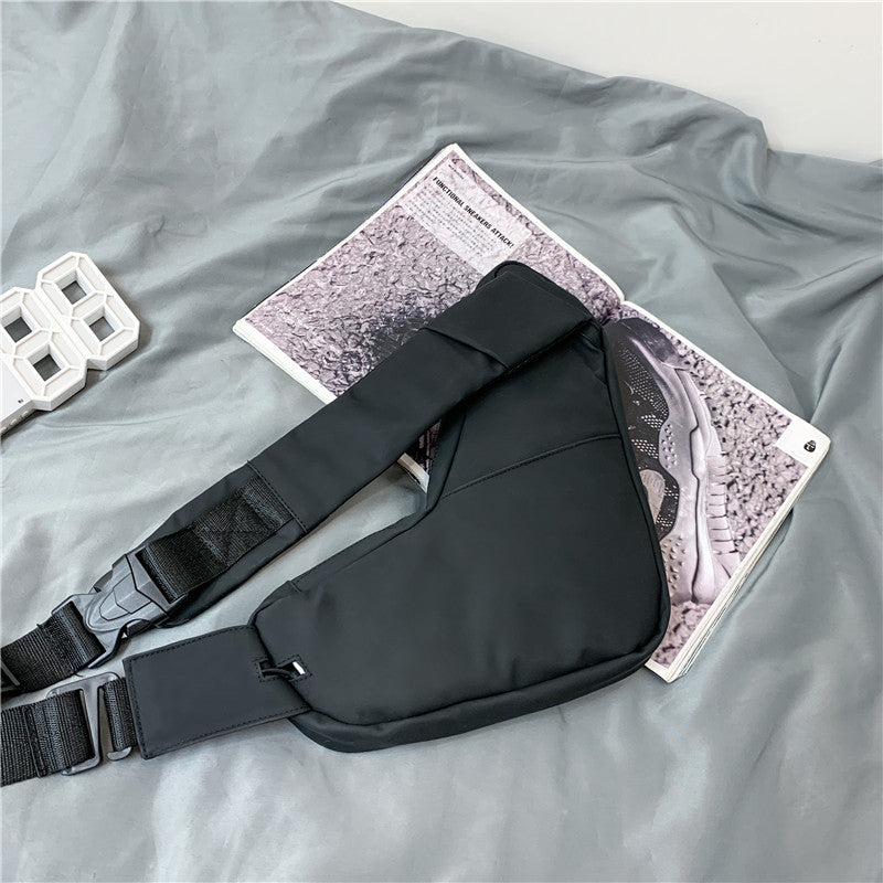 He+It+She Universal Crossbody black unisex sling bag with USB charging port and adjustable strap