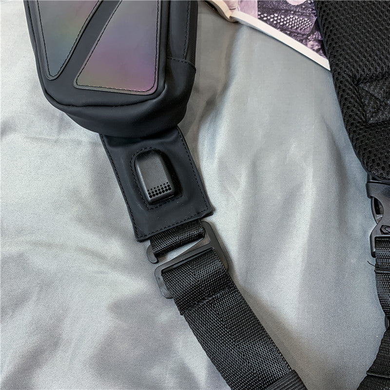 Black He+It+She Universal Crossbody sling bag strap with USB charging port and adjustable buckle close-up
