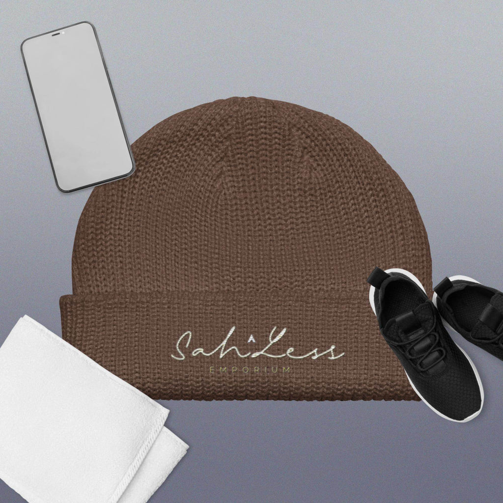 Fisherman beanie by SahLess Emporium displayed with casual accessories.