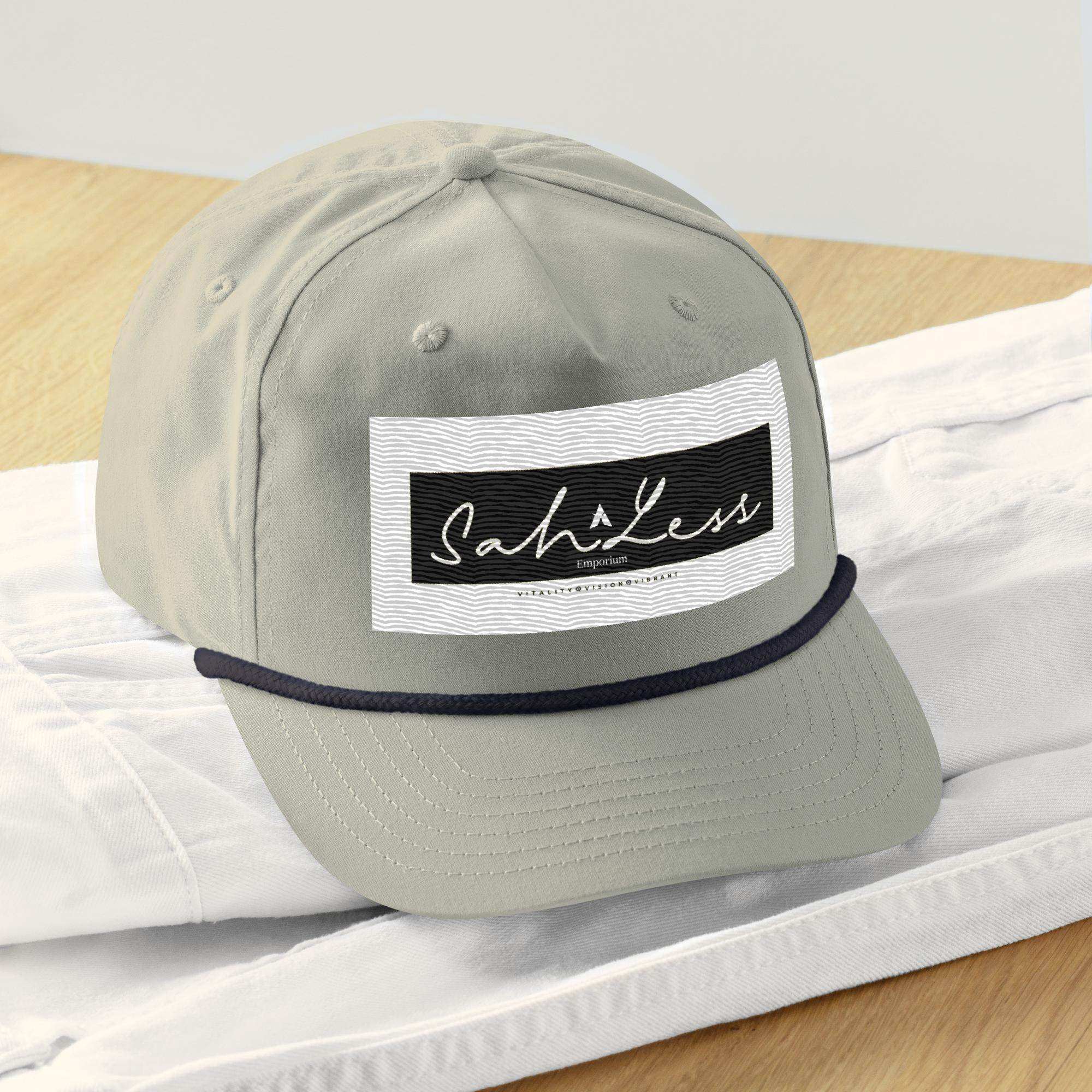 Snapback Rope Cap by SahLess Emporium with a stylish front rope detail.