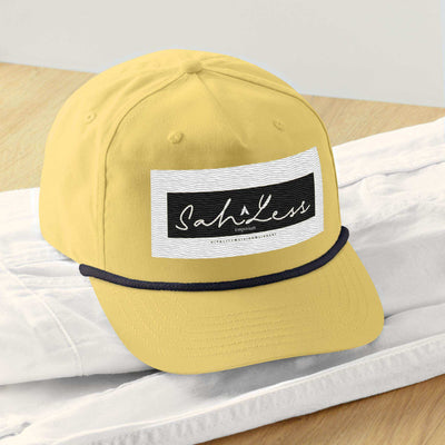 Snapback Rope Cap from SahLess Emporium with stylish rope detail and adjustable closure.