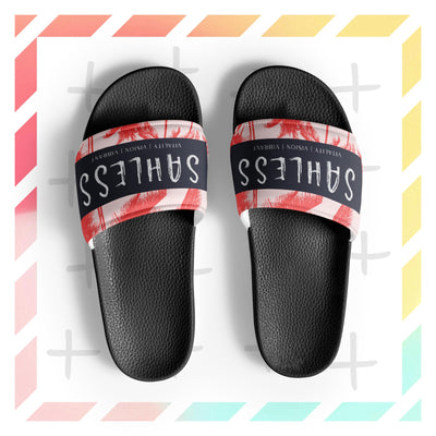 Men’s slides with cushioned faux leather strap and textured footbed from SahLess Emporium.