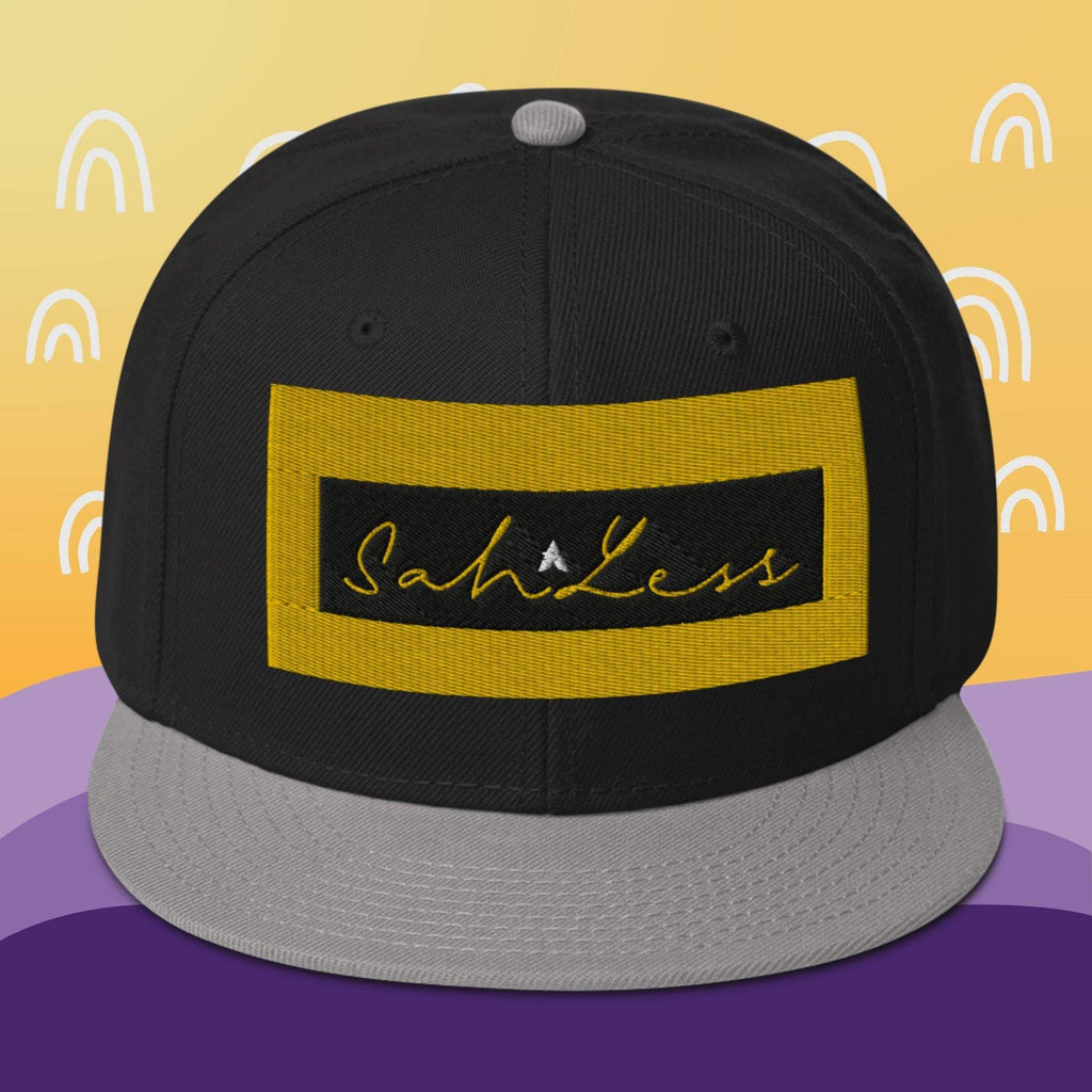 Structured Snapback SahLess Hat with grey visor and logo.