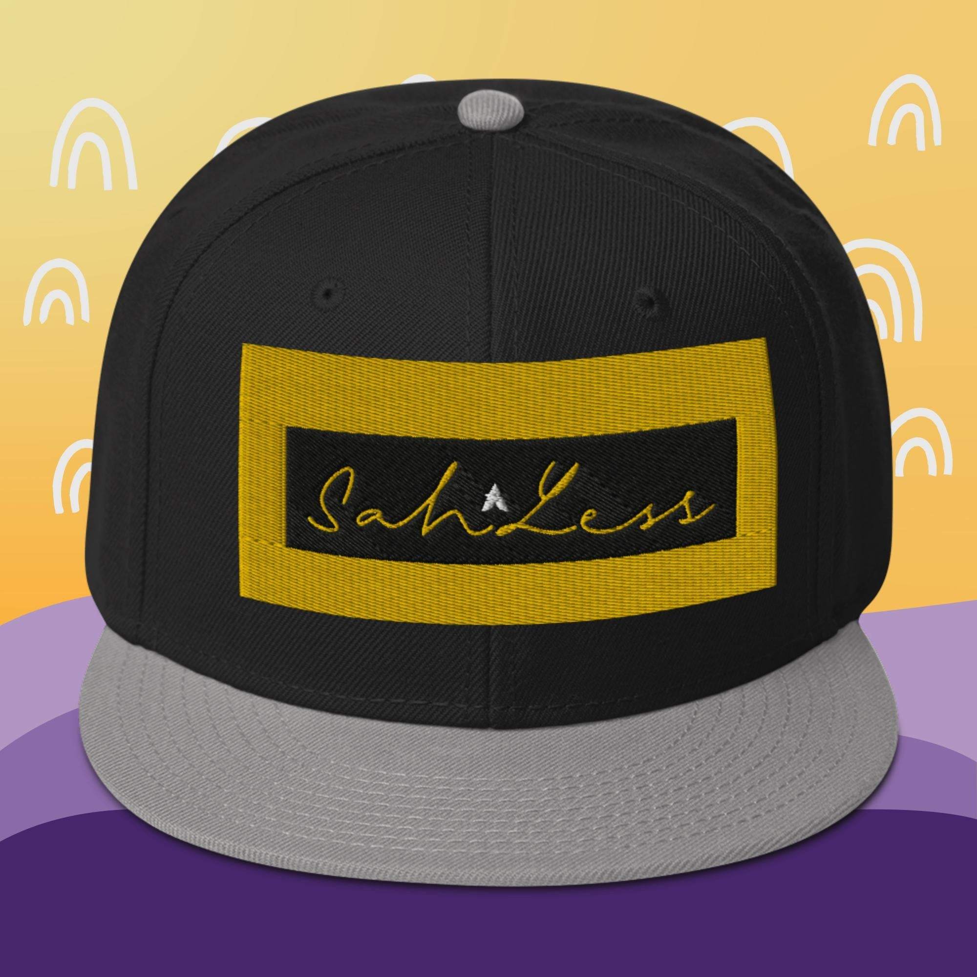 Structured Snapback SahLess Hat with grey visor and logo.