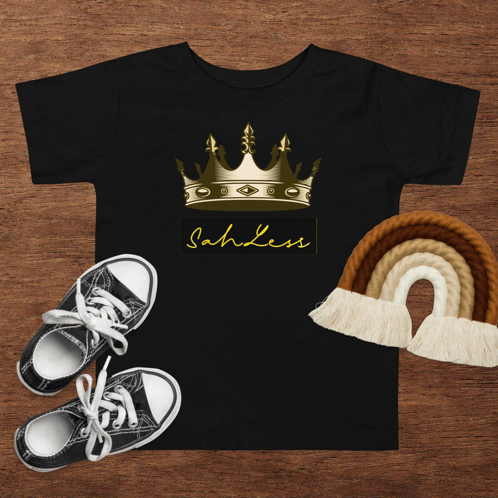Toddler short sleeve black tee with crown design and "SahLess" text, 100% cotton.