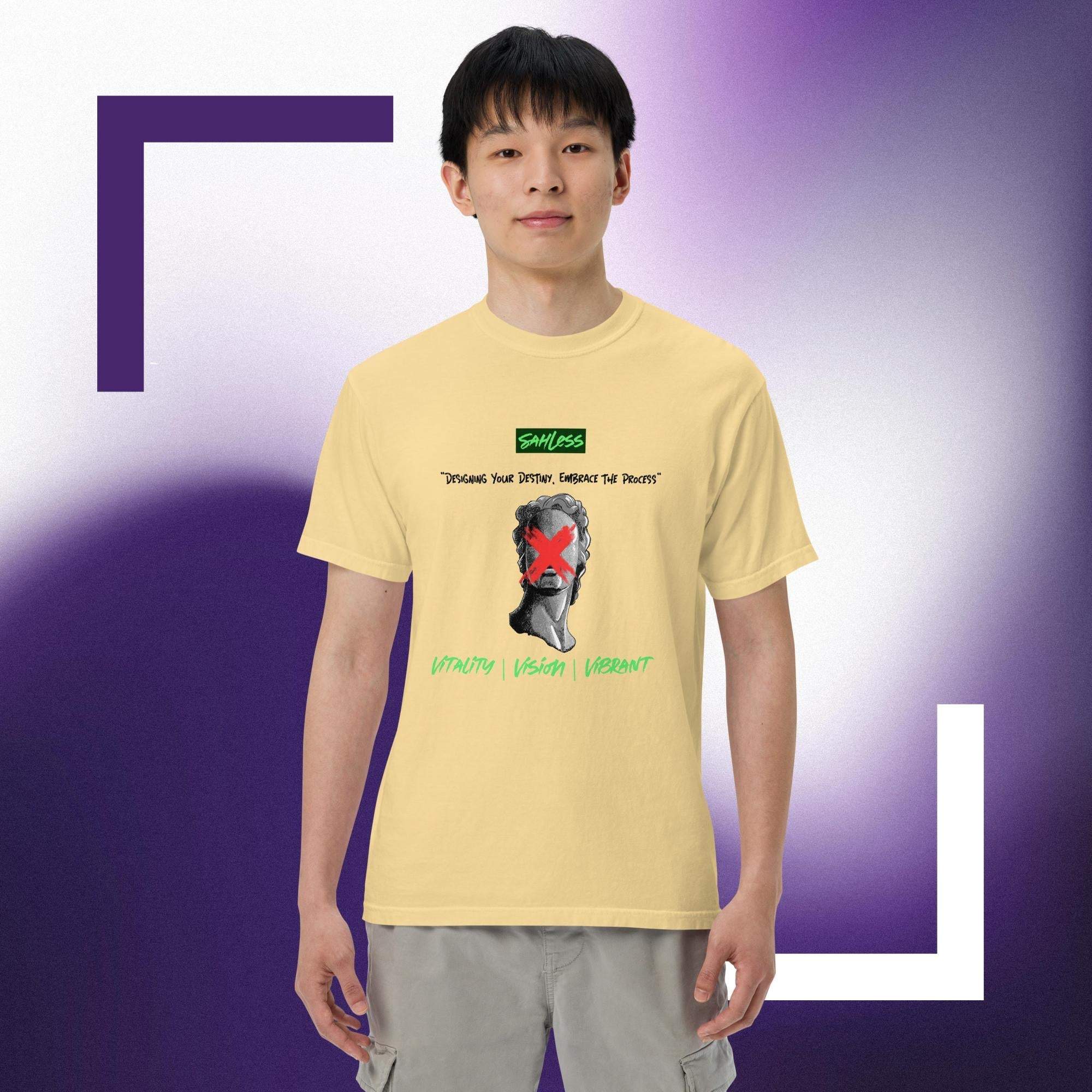 Unisex heavyweight garment-dyed T-shirt in soft yellow, worn by a model, made of 100% ring-spun cotton for a relaxed fit.