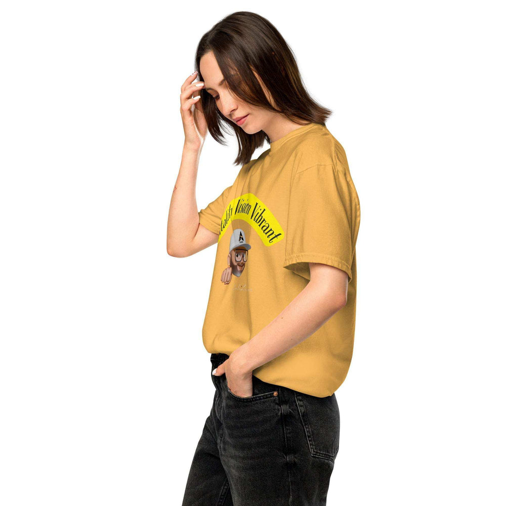 Unisex heavyweight t-shirt in yellow, featuring a relaxed fit, worn by a person with hands in pockets.