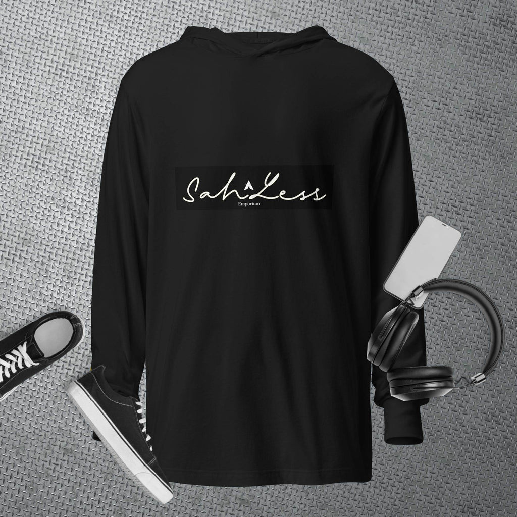 Black hooded long-sleeve tee from SahLess Emporium styled with casual sneakers and headphones, perfect for a laid-back look.
