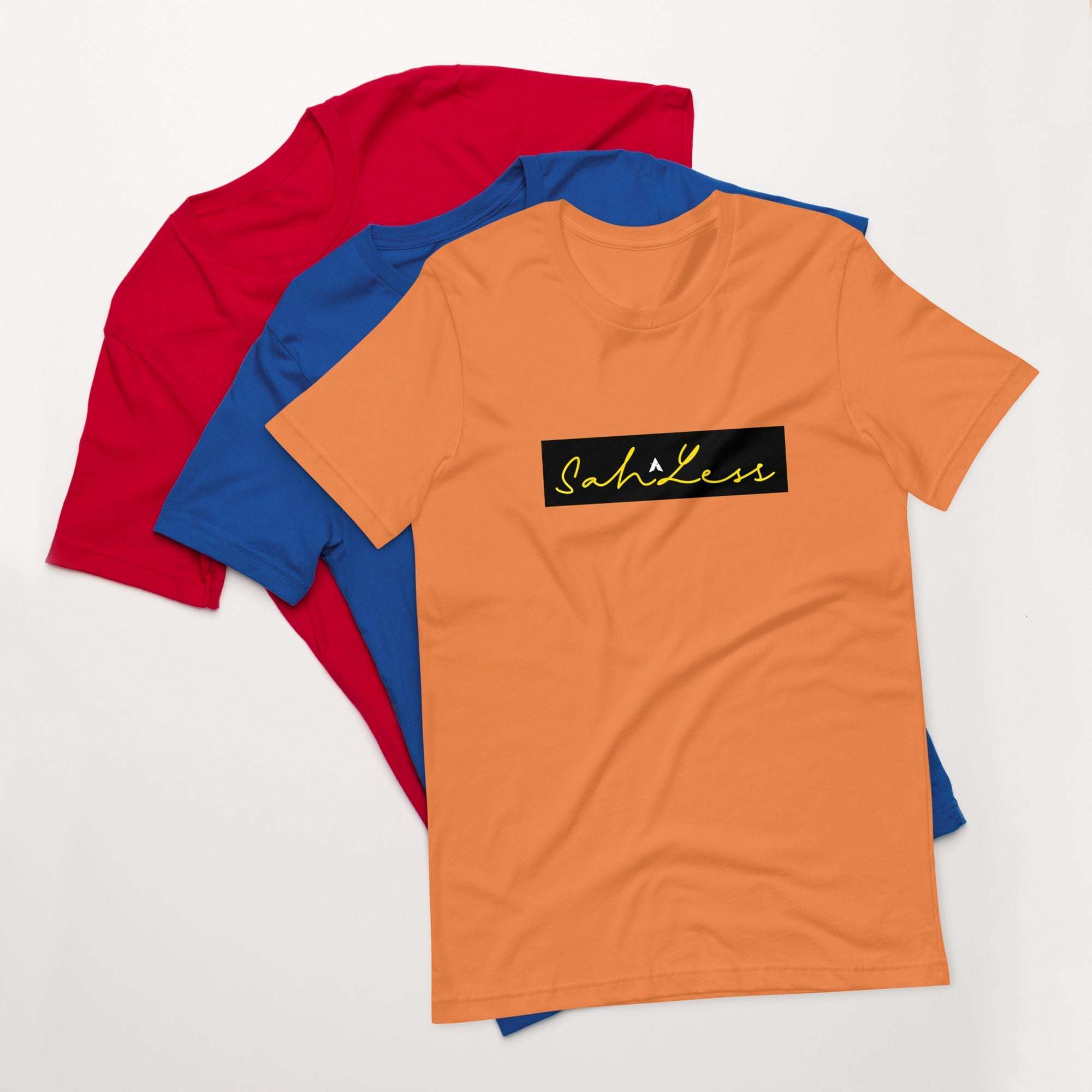 Unisex t-shirt with Stamp Signature SahLess design in orange, blue, and red in a casual layout.