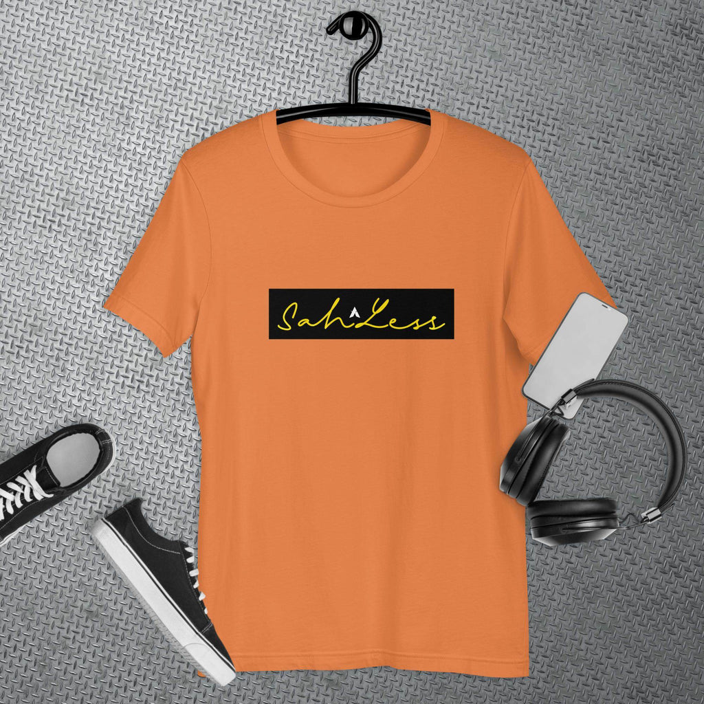 SahLess Signature Unisex T-shirt in orange, featuring lightweight cotton, side-seamed construction, and shoulder-to-shoulder taping.