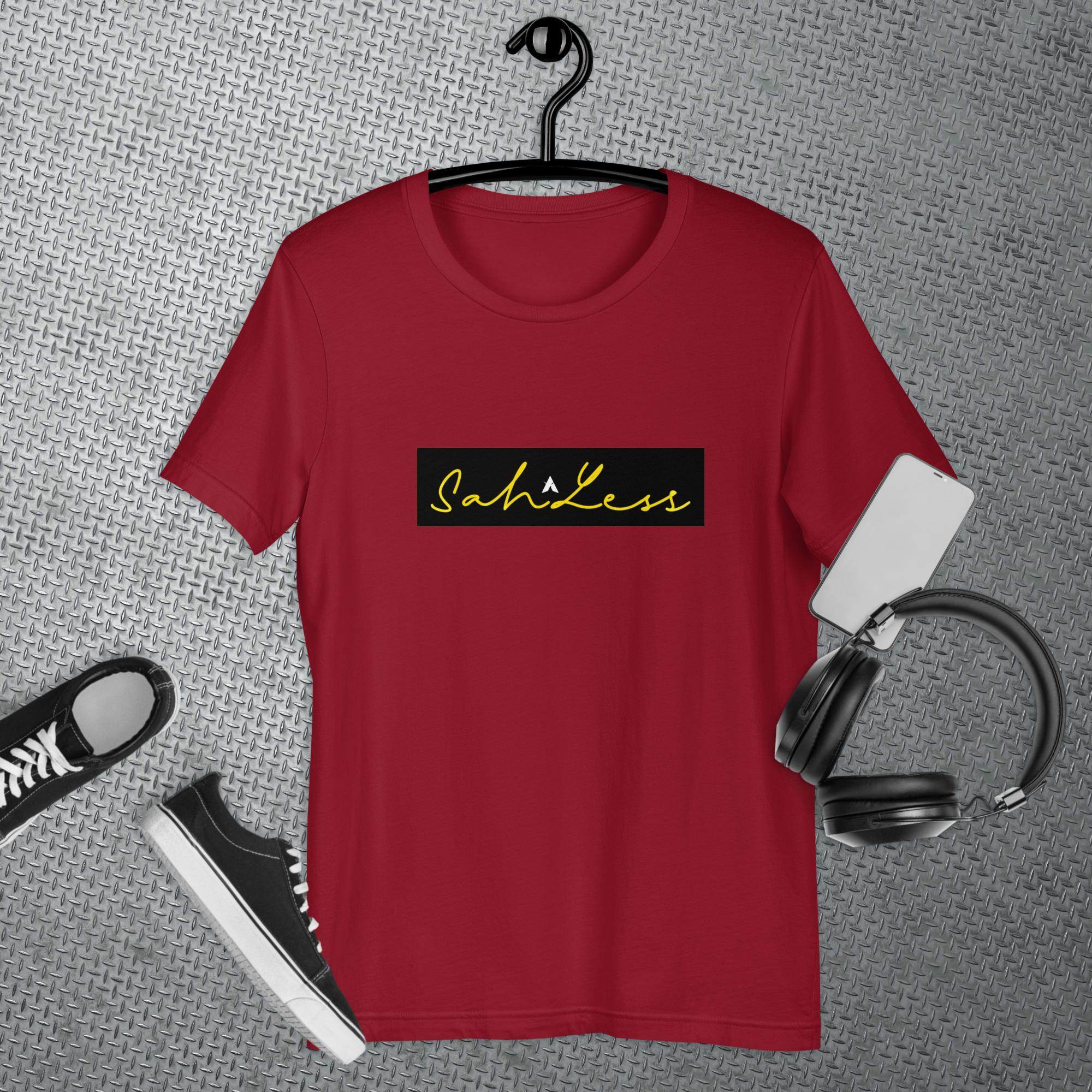 SahLess Signature Unisex T-shirt in red, perfect for casual wear, 100% cotton, displayed with accessories.