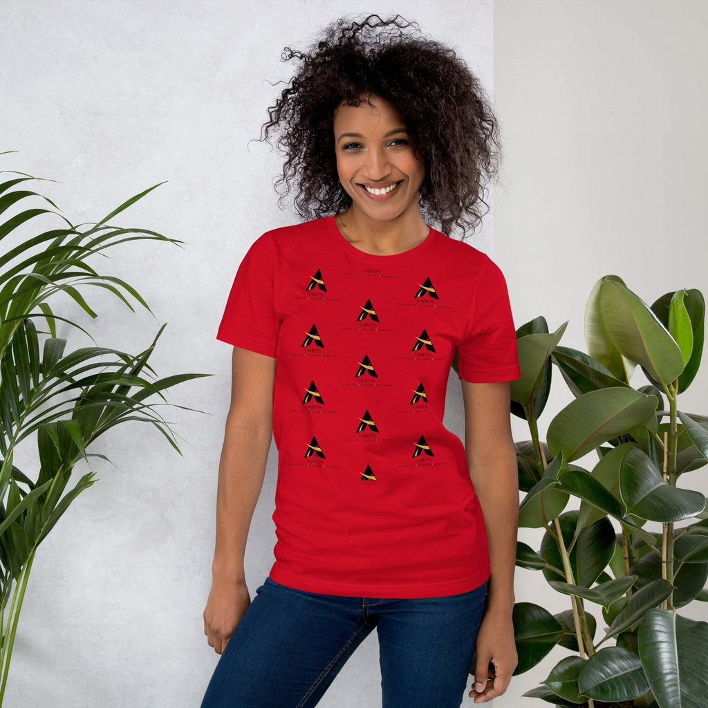 Unisex SahLess T-shirt in red, featuring unique graphic design, worn by a smiling person standing next to plants.