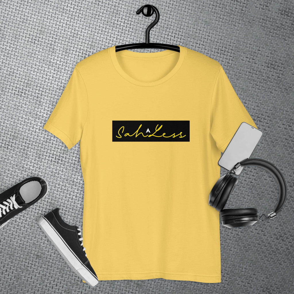 SahLess Signature Unisex T-shirt in yellow displayed with accessories.