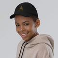 Youth cap baseball in black, SahLess branded, with adjustable strap and breathable eyelets.