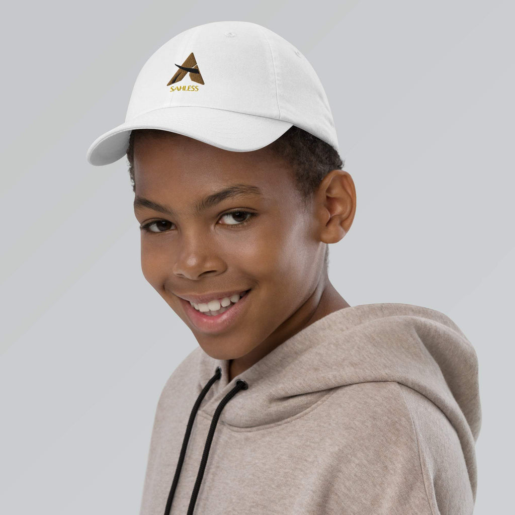 Youth wearing SahLess youth baseball cap with adjustable strap and pre-curved visor.
