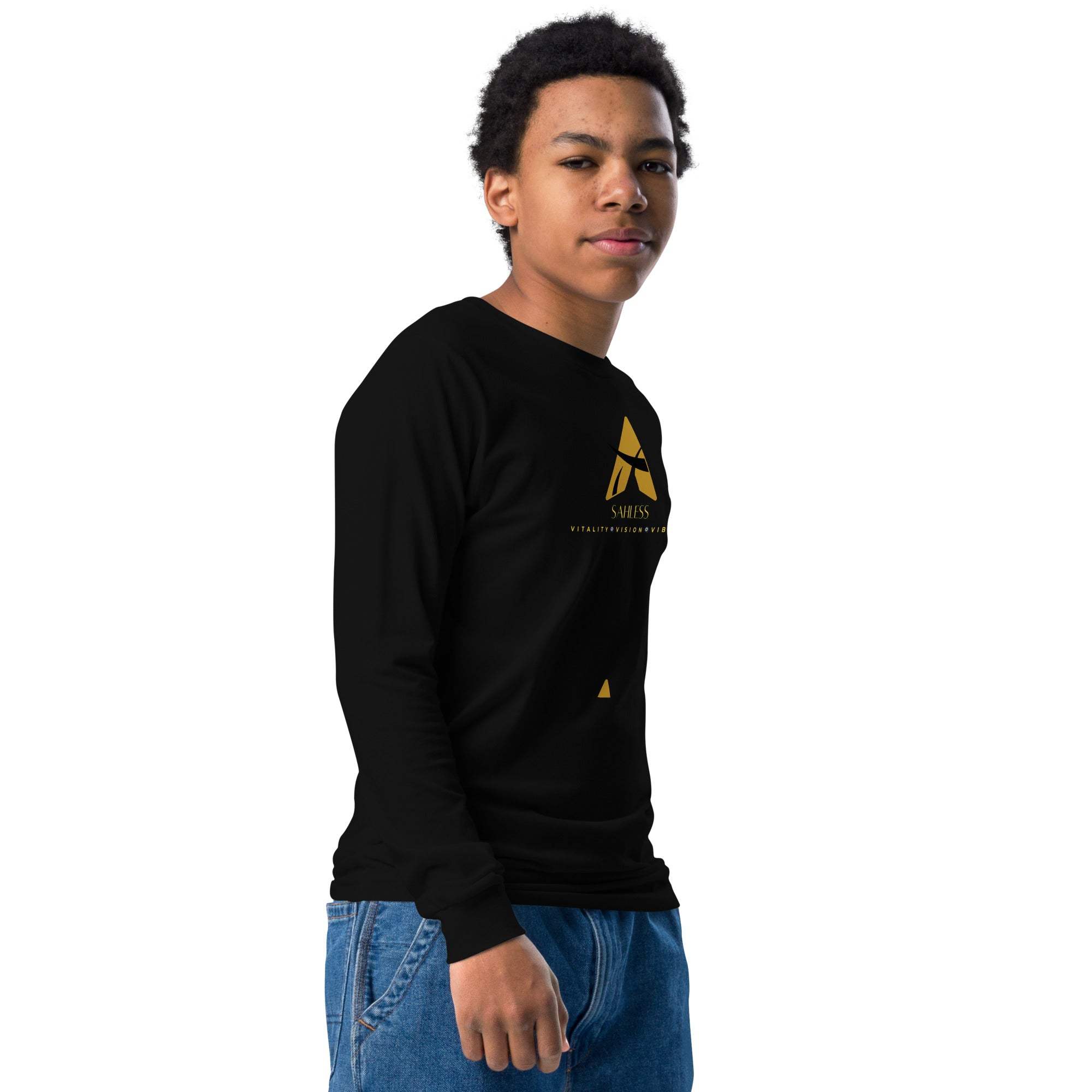 Youth wearing Sahaless long sleeve tee in black, soft cotton, with ribbed cuffs.