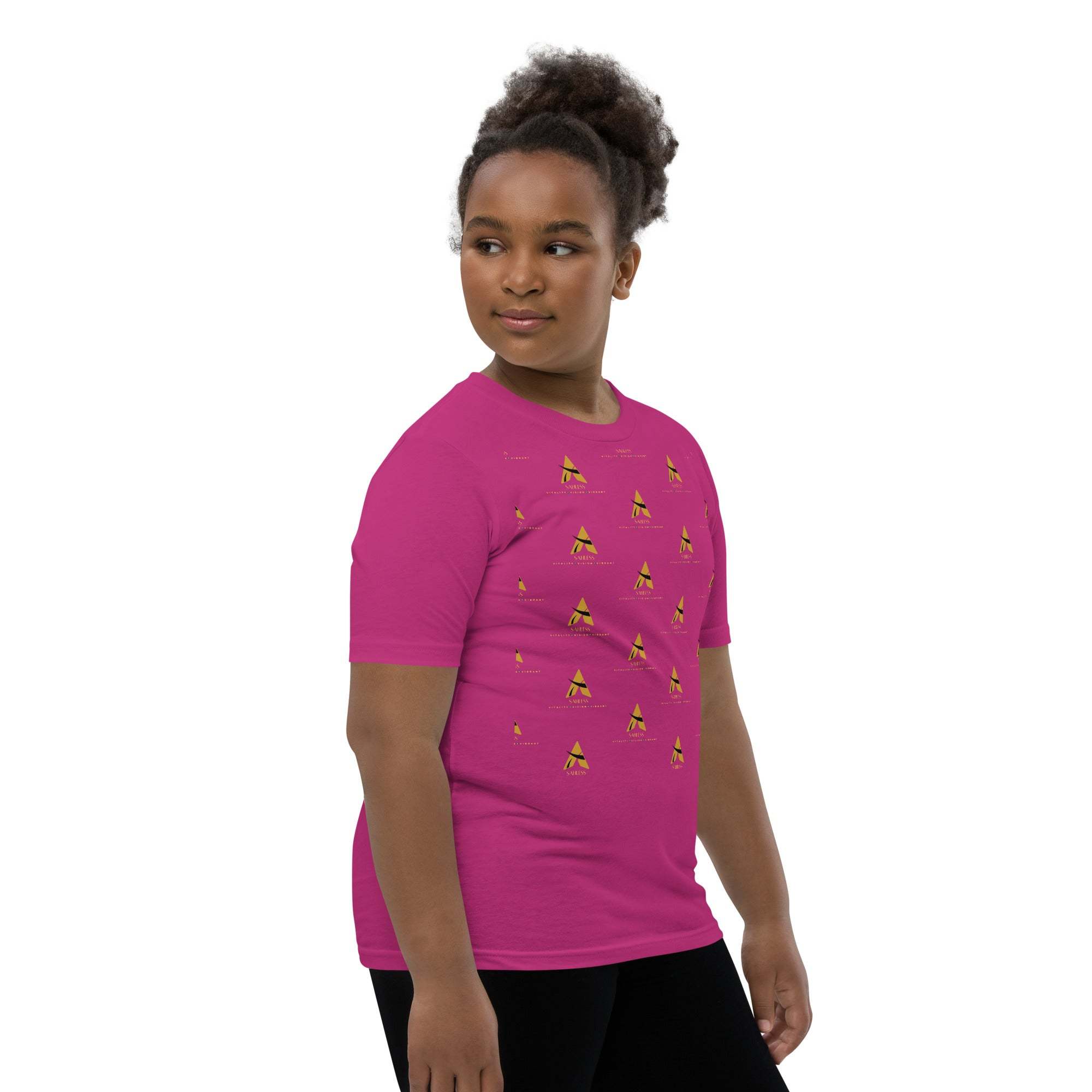 Youth wearing a vibrant pink SahLess Short Sleeve T-Shirt with unique design.