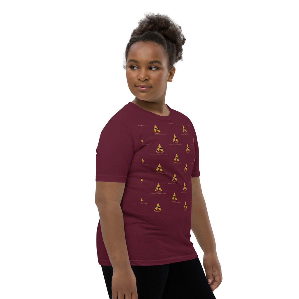 Youth wearing a SahLess Short Sleeve T-Shirt, featuring a unique design on a maroon background, made from soft cotton.
