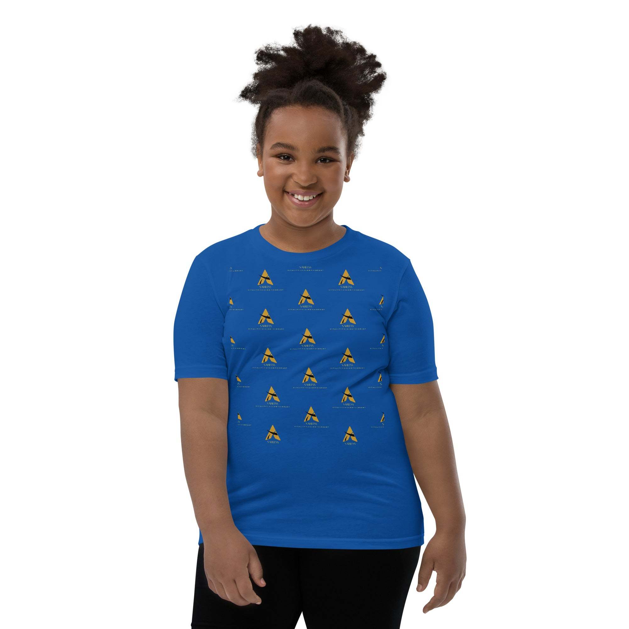 Youth wearing a blue SahLess Short Sleeve T-Shirt with unique design, smiling.